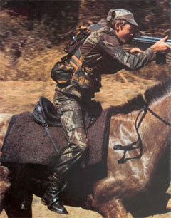 Neville, shooting from the saddle